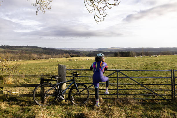 Cyclist breathing deeply at a scenic viewpoint on a Yorkshire hill